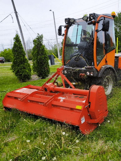 Karcher flail mower attachment for municipal equipment in use