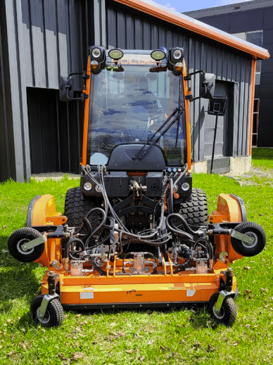 Karcher tri-deck mower attachment for municipal equipment in use