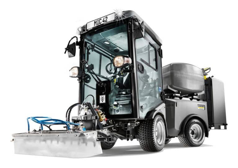 Karcher hot water weed killer attachment for municipal sweepers in use