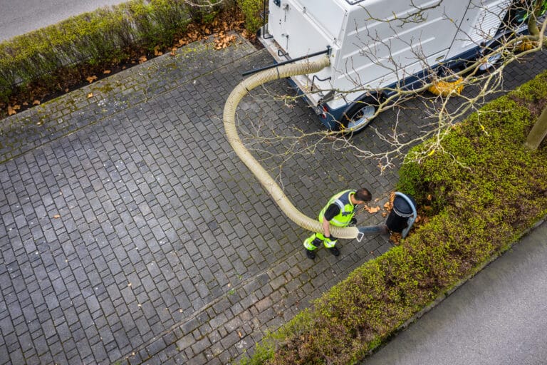 Karcher 4.5 m manual suction hose attachment for municipal equipment in use