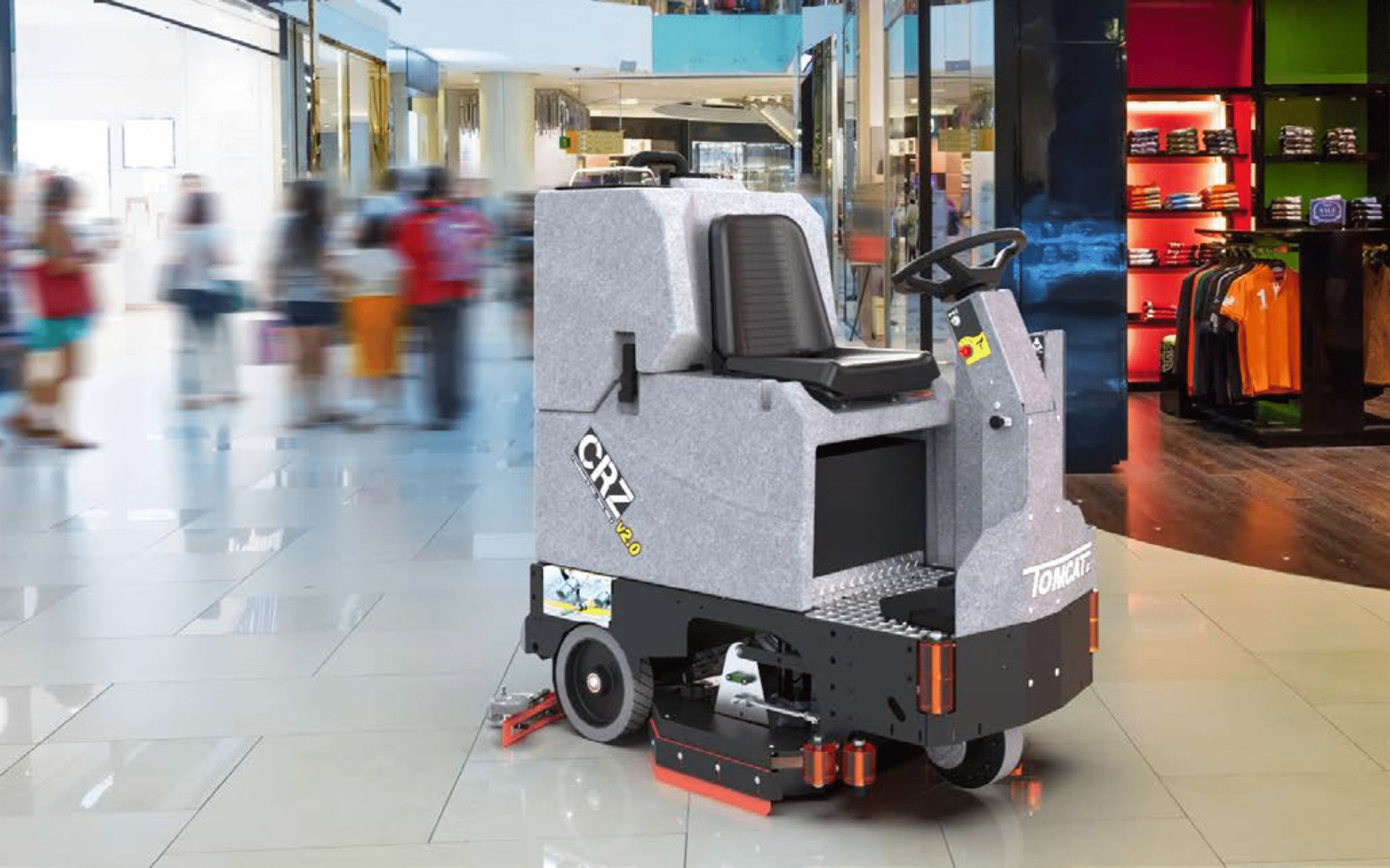 Tomcat CRZ high performance ride on scrubber in use at a retail mall